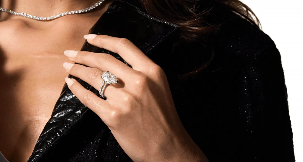 Female model wearing New labgrown diamond engagement ring on left  hand by Jean Dousset